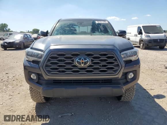 2021 Toyota Tacoma TRD Off Road с VIN 3TMCZ5AN4MM445659, выставлен на аукционе Copart как лот 70141145 с пробегом 104 371 миль миль и Списание • Salvage title. История ставок и продаж доступна на DreamBid. Изображение 5.