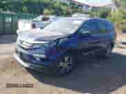 2016 Honda Pilot EX-L with VIN 5FNYF6H84GB064732, listed as a IAAI auction lot 43357342 with 220,420 mi miles and . Bid and sale history available at DreamBid. Image 2.