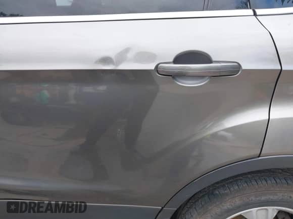 2014 Ford Escape SE z VIN 1FMCU0GX4EUD79133, wystawiony jako IAAI lot #42881509 z przebiegiem 158 715 mil mil oraz . Historia ofert i sprzedaży dostępna na DreamBid. Obrazek 18.