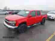 2012 Chevrolet Colorado 2LT z VIN 1GCHTDFE5C8116837, wystawiony jako IAAI lot #42084260 z przebiegiem 116 985 mil mil oraz . Historia ofert i sprzedaży dostępna na DreamBid. Obrazek 2.