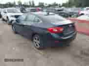 2016 Chevrolet Cruze Premier z VIN 1G1BG5SM3G7310042, wystawiony jako IAAI lot #43433758 z przebiegiem 219 405 mil mil oraz . Historia ofert i sprzedaży dostępna na DreamBid. Obrazek 3.