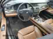 2011 BMW 7 Series 740i with VIN WBAKA4C51BC612517, listed as a Copart auction lot 76987474 with Not provided miles and Salvage title. Bid and sale history available at DreamBid. Image 8.