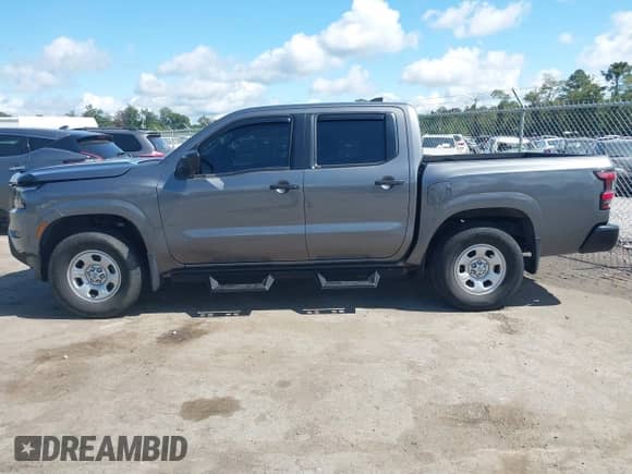 2023 Nissan Frontier Pro-4X with VIN 1N6ED1EK8PN616467, listed as a IAAI auction lot 43165401 with 20,003 mi miles and . Bid and sale history available at DreamBid. Image 14.