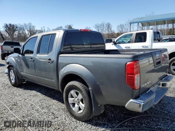 2005 Nissan Frontier SE z VIN 1N6AD07W15C405757, wystawiony jako Copart lot #45970205 z przebiegiem 203 775 mil mil oraz Szkoda całkowita • Salvage title. Historia ofert i sprzedaży dostępna na DreamBid. Obrazek 2.