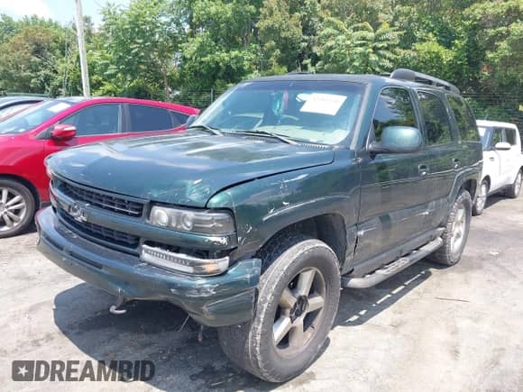 2003 Chevrolet Tahoe Z71 с VIN 1GNEK13Z33R245611, выставлен на аукционе IAAI как лот 42481140 с пробегом 260 757 миль миль и . История ставок и продаж доступна на DreamBid. Изображение 2.