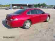 2014 Chevrolet Impala LT with VIN 2G1WB5E34E1163971, listed as a IAAI auction lot 43047669 with 215,678 mi miles and . Bid and sale history available at DreamBid. Image 4.
