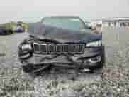 2018 Jeep Grand Cherokee Laredo E with VIN 1C4RJEAG1JC451192, listed as a Copart auction lot 65430435 with 177,827 mi miles and Salvage title. Bid and sale history available at DreamBid. Image 14.