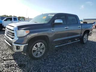 2017 Toyota Tundra Platinum с VIN 5TFGW5F13HX227857, выставлен на аукционе Copart как лот 64948535 с пробегом 78 985 миль миль и Списание • Salvage title. История ставок и продаж доступна на DreamBid. Изображение 1.
