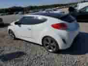 2013 Hyundai Veloster w/Gray Int z VIN KMHTC6AD4DU104557, wystawiony jako Copart lot #86129525 z przebiegiem 109 991 mil mil oraz Szkoda całkowita • Salvage title. Historia ofert i sprzedaży dostępna na DreamBid. Obrazek 2.