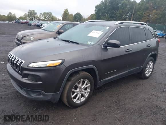 2014 Jeep Cherokee Latitude with VIN 1C4PJMCB4EW220486, listed as a IAAI auction lot 43438847 with 167,956 mi miles and . Bid and sale history available at DreamBid. Image 2.