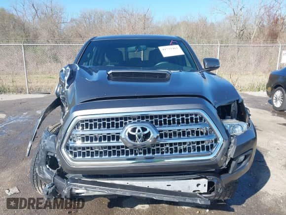 2017 Toyota Tacoma TRD Off Road with VIN 5TFAZ5CN2HX027623, listed as a IAAI auction lot 41731461 with 103,232 mi miles and . Bid and sale history available at DreamBid. Image 12.