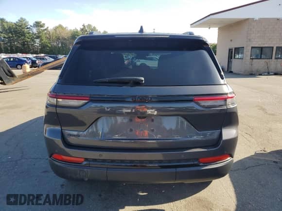 2023 Jeep Grand Cherokee Laredo with VIN 1C4RJHAG7PC542770, listed as a Copart auction lot 52511565 with 42,090 mi miles and Salvage title. Bid and sale history available at DreamBid. Image 6.