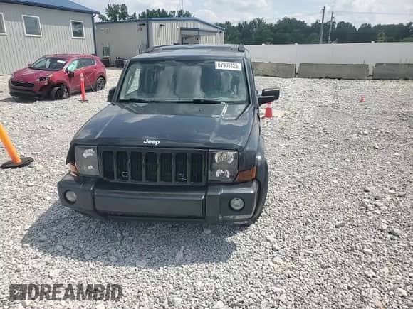 2006 Jeep Commander z VIN 1J8HG48NX6C310730, wystawiony jako Copart lot #67908125 z przebiegiem 150 144 mil mil oraz Szkoda całkowita • Salvage title. Historia ofert i sprzedaży dostępna na DreamBid. Obrazek 14.