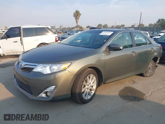 2012 Toyota Camry XLE with VIN 4T1BD1FK5CU028221, listed as a IAAI auction lot 42896011 with 270,096 mi miles and . Bid and sale history available at DreamBid. Image 2.