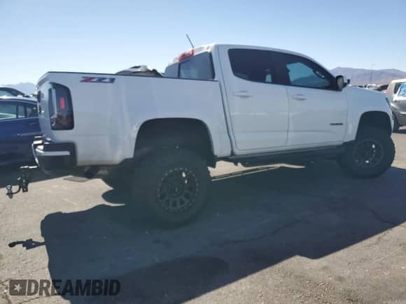 2019 Chevrolet Colorado 2WD Z71 with VIN 1GCGSDEN6K1349228, listed as a Copart auction lot 65421795 with 75,599 mi miles and Salvage title. Bid and sale history available at DreamBid. Image 3.