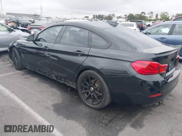 2018 BMW 4 Series 430i with VIN WBA4J1C54JBM11044, listed as a IAAI auction lot 42709833 with 94,624 mi miles and . Bid and sale history available at DreamBid. Image 3.