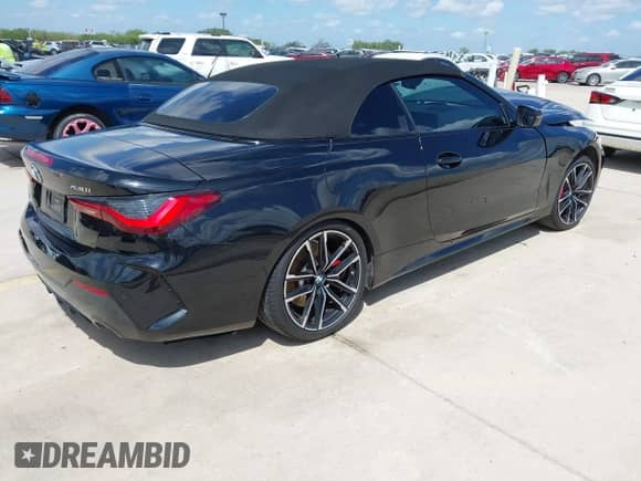 2023 BMW 4 Series 430i with VIN WBA23AT0XPCL41770, listed as a IAAI auction lot 42586472 with 38,241 mi miles and . Bid and sale history available at DreamBid. Image 4.