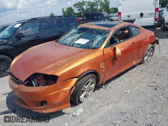 2006 Hyundai Tiburon GT с VIN KMHHN65F66U210071, выставлен на аукционе IAAI как лот 42752874 с пробегом Не указан миль и . История ставок и продаж доступна на DreamBid. Изображение 16.