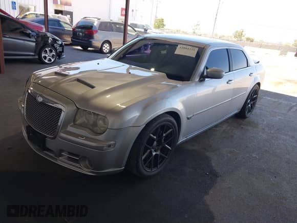 2006 Chrysler 300 C SRT-8 with VIN 2C3LA73W26H471000, listed as a IAAI auction lot 42884335 with 148,180 mi miles and . Bid and sale history available at DreamBid. Image 2.