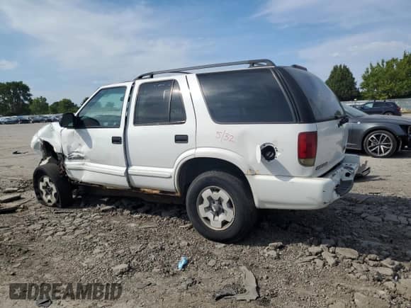 2004 Chevrolet Blazer LS with VIN 1GNDT13X54K146919, listed as a Copart auction lot 71603905 with Not provided miles and Salvage title. Bid and sale history available at DreamBid. Image 2.