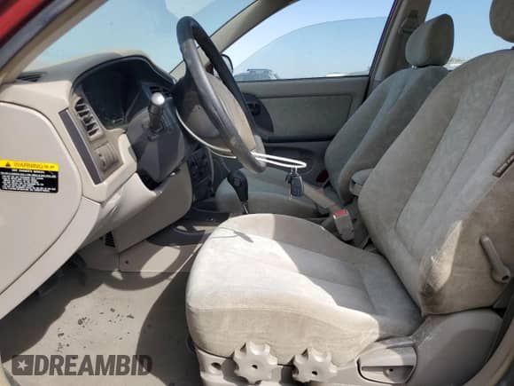 2002 Hyundai Elantra GLS with VIN KMHDN45D22U393108, listed as a Copart auction lot 81213155 with 138,798 mi miles and Salvage title. Bid and sale history available at DreamBid. Image 7.