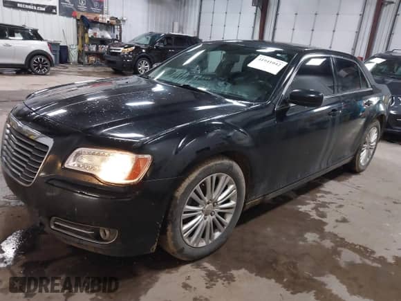 2013 Chrysler 300 with VIN 2C3CCARG0DH736159, listed as a IAAI auction lot 41941042 with 137,661 mi miles and . Bid and sale history available at DreamBid. Image 2.