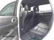 2018 Jeep Grand Cherokee Sterling with VIN 1C4RJFBG7JC263183, listed as a IAAI auction lot 41801205 with 104,301 mi miles and . Bid and sale history available at DreamBid. Image 8.