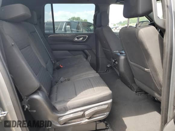 2023 Chevrolet Suburban LS z VIN 1GNSCBKD7PR122394, wystawiony jako Copart lot #63259315 z przebiegiem 54 885 mil mil oraz Szkoda całkowita • Salvage title. Historia ofert i sprzedaży dostępna na DreamBid. Obrazek 11.