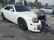 2007 Chrysler 300 C SRT-8 with VIN 2C3LA73W17H659735, listed as a IAAI auction lot 41688198 with 132,785 mi miles and . Bid and sale history available at DreamBid. Image 1.