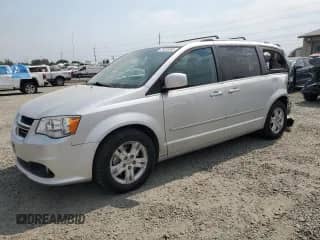 2012 Dodge Grand Caravan Crew with VIN 2C4RDGDG2CR387480, listed as a Copart auction lot 70338385 with 78,881 mi miles and Salvage title. Bid and sale history available at DreamBid. Image 1.