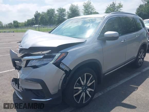 2022 Honda Pilot Elite z VIN 5FNYF6H08NB030669, wystawiony jako IAAI lot #42537378 z przebiegiem 70 169 mil mil oraz . Historia ofert i sprzedaży dostępna na DreamBid. Obrazek 2.