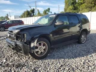 2011 Chevrolet Tahoe LS с VIN 1GNSCAE0XBR223506, выставлен на аукционе Copart как лот 87433045 с пробегом 156 433 миль миль и Списание • Salvage title. История ставок и продаж доступна на DreamBid. Изображение 1.