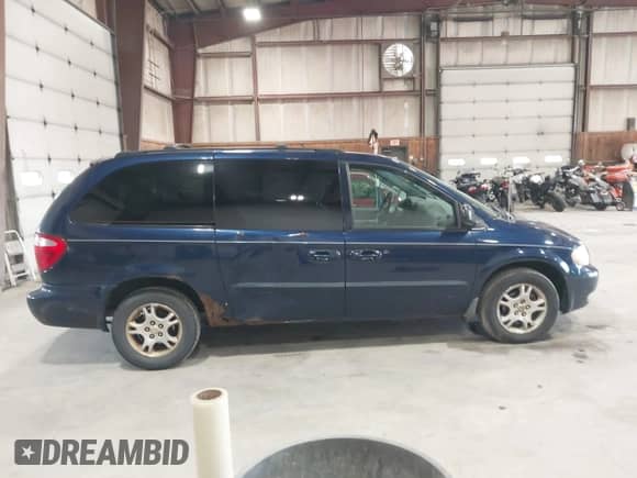 2003 Dodge Caravan EX with VIN 2D4GP74L13R262825, listed as a IAAI auction lot 42424691 with 264,489 mi miles and . Bid and sale history available at DreamBid. Image 13.