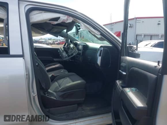 2018 Chevrolet Silverado 1500 LT z VIN 3GCUKREC0JG402410, wystawiony jako IAAI lot #43034711 z przebiegiem 73 836 mil mil oraz . Historia ofert i sprzedaży dostępna na DreamBid. Obrazek 5.