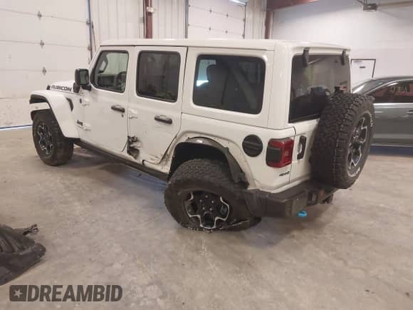 2022 Jeep Wrangler Unlimited Rubicon with VIN 1C4JJXR61NW264155, listed as a IAAI auction lot 41821982 with 48,325 mi miles and . Bid and sale history available at DreamBid. Image 3.