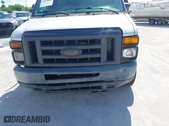2014 Ford Econoline Cargo Commercial with VIN 1FTNE1EW4EDB05697, listed as a IAAI auction lot 42899014 with 216,329 mi miles and . Bid and sale history available at DreamBid. Image 6.
