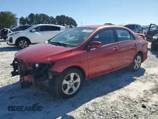 2011 Toyota Corolla S with VIN 2T1BU4EE4BC566809, listed as a Copart auction lot 81890395 with 128,503 mi miles and Salvage title. Bid and sale history available at DreamBid. Image 1.