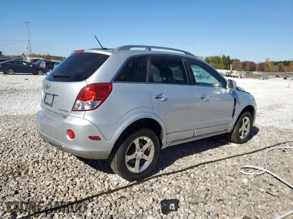 2012 Chevrolet Captiva Sport LTZ z VIN 3GNFL4E56CS594174, wystawiony jako Copart lot #74492554 z przebiegiem 129 625 mil mil oraz Czysty tytuł • Clean title. Historia ofert i sprzedaży dostępna na DreamBid. Obrazek 3.