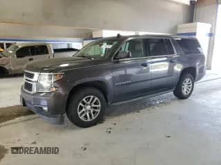 2016 Chevrolet Suburban LT with VIN 1GNSKHKC5GR147050, listed as a Copart auction lot 81402405 with 242,097 mi miles and Salvage title. Bid and sale history available at DreamBid. Image 1.
