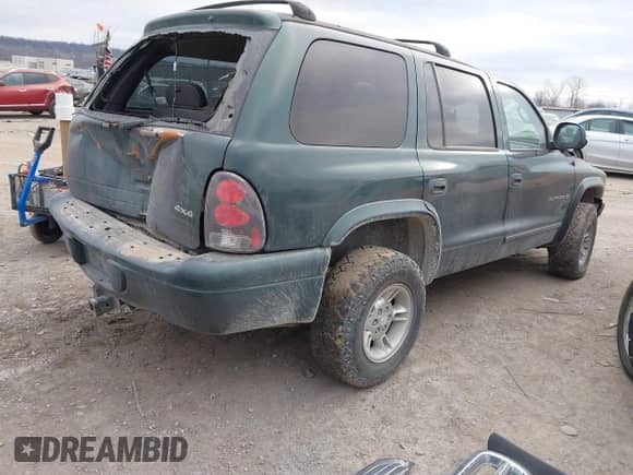 1999 Dodge Durango with VIN 1B4HS28Z6XF658583, listed as a IAAI auction lot 41698221 with 297,598 mi miles and . Bid and sale history available at DreamBid. Image 4.