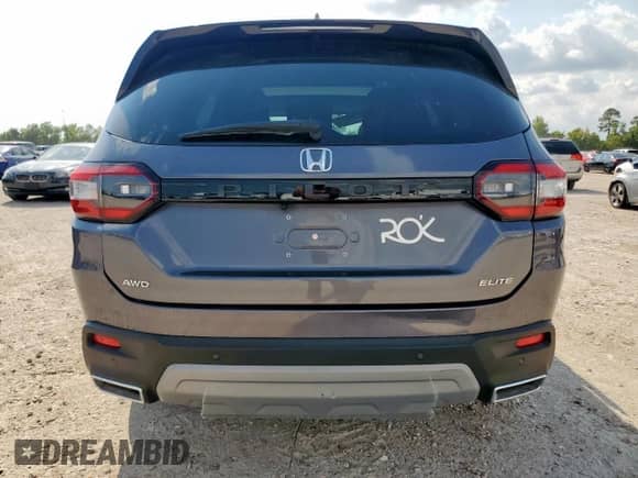 2025 Honda Pilot Elite с VIN 5FNYG1H88SB029670, выставлен на аукционе Copart как лот 80673155 с пробегом Не указан миль и Списание • Salvage title. История ставок и продаж доступна на DreamBid. Изображение 6.