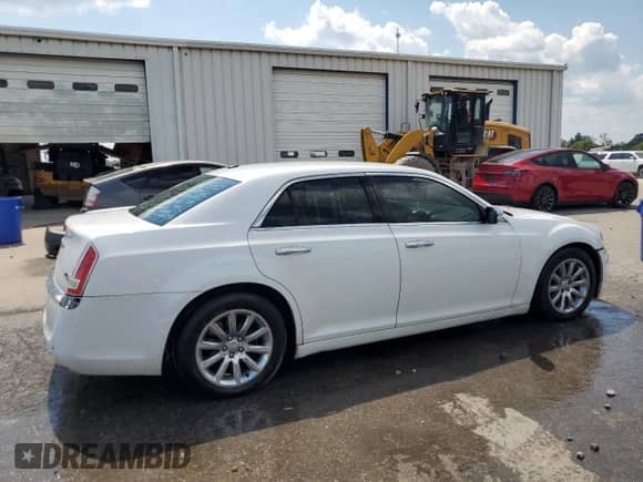 2013 Chrysler 300 C с VIN 2C3CCAETXDH508172, выставлен на аукционе Copart как лот 71185825 с пробегом 219 893 миль миль и Списание • Salvage title. История ставок и продаж доступна на DreamBid. Изображение 3.