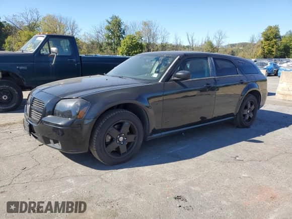 2005 Dodge Magnum SXT with VIN 2D4GZ48V55H537464, listed as a Copart auction lot 85140395 with 83,980 mi miles and Clean title. Bid and sale history available at DreamBid. Image 1.