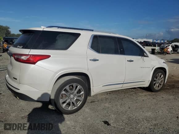 2018 Chevrolet Traverse Premier with VIN 1GNERKKW6JJ156068, listed as a Copart auction lot 81706905 with 148,091 mi miles and Salvage title. Bid and sale history available at DreamBid. Image 3.