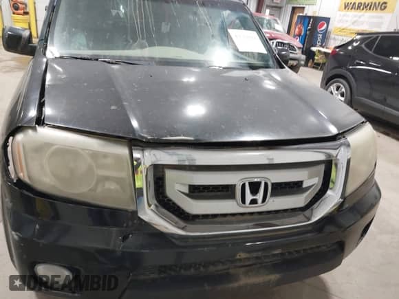 2011 Honda Pilot EX with VIN 5FNYF4H46BB014571, listed as a IAAI auction lot 43572141 with 243,613 mi miles and . Bid and sale history available at DreamBid. Image 11.