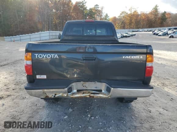 2001 Toyota Tacoma with VIN 5TEWN72N81Z873896, listed as a Copart auction lot 82741565 with 186,530 mi miles and Clean title. Bid and sale history available at DreamBid. Image 6.