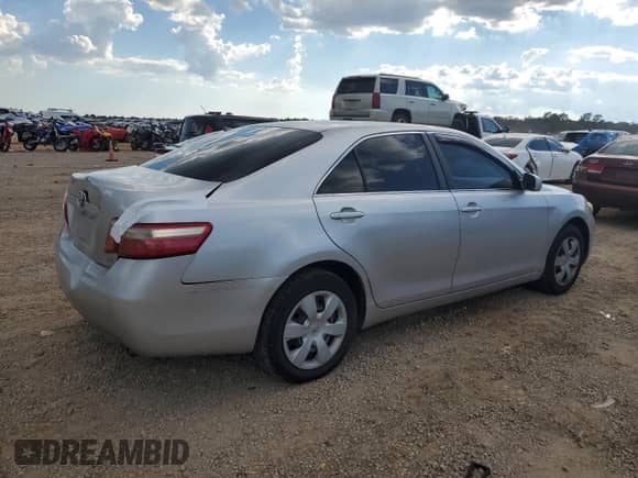 2007 Toyota Camry LE с VIN 4T1BE46K17U655941, выставлен на аукционе Copart как лот 81028335 с пробегом 254 032 миль миль и Списание • Salvage title. История ставок и продаж доступна на DreamBid. Изображение 3.
