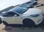 2022 Tesla Model Y Long Range z VIN 7SAYGDEE1NA003346, wystawiony jako IAAI lot #42966899 z przebiegiem 86 422 mil mil oraz . Historia ofert i sprzedaży dostępna na DreamBid. Obrazek 13.