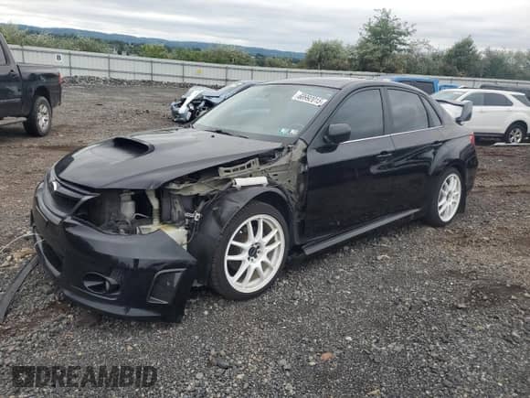 2013 Subaru WRX WRX with VIN JF1GV7F6XDG013619, listed as a Copart auction lot 68992015 with 141,795 mi miles and Salvage title. Bid and sale history available at DreamBid. Image 1.