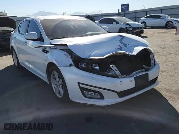 2015 Kia Optima LX с VIN KNAGM4A79F5633918, выставлен на аукционе Copart как лот 82300825 с пробегом 99 684 миль миль и Списание • Salvage title. История ставок и продаж доступна на DreamBid. Изображение 13.